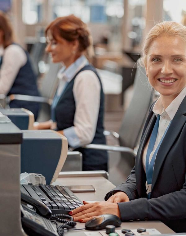 passport-control-workers-sitting-at-their-workplac-5ZM4YZ6.jpg